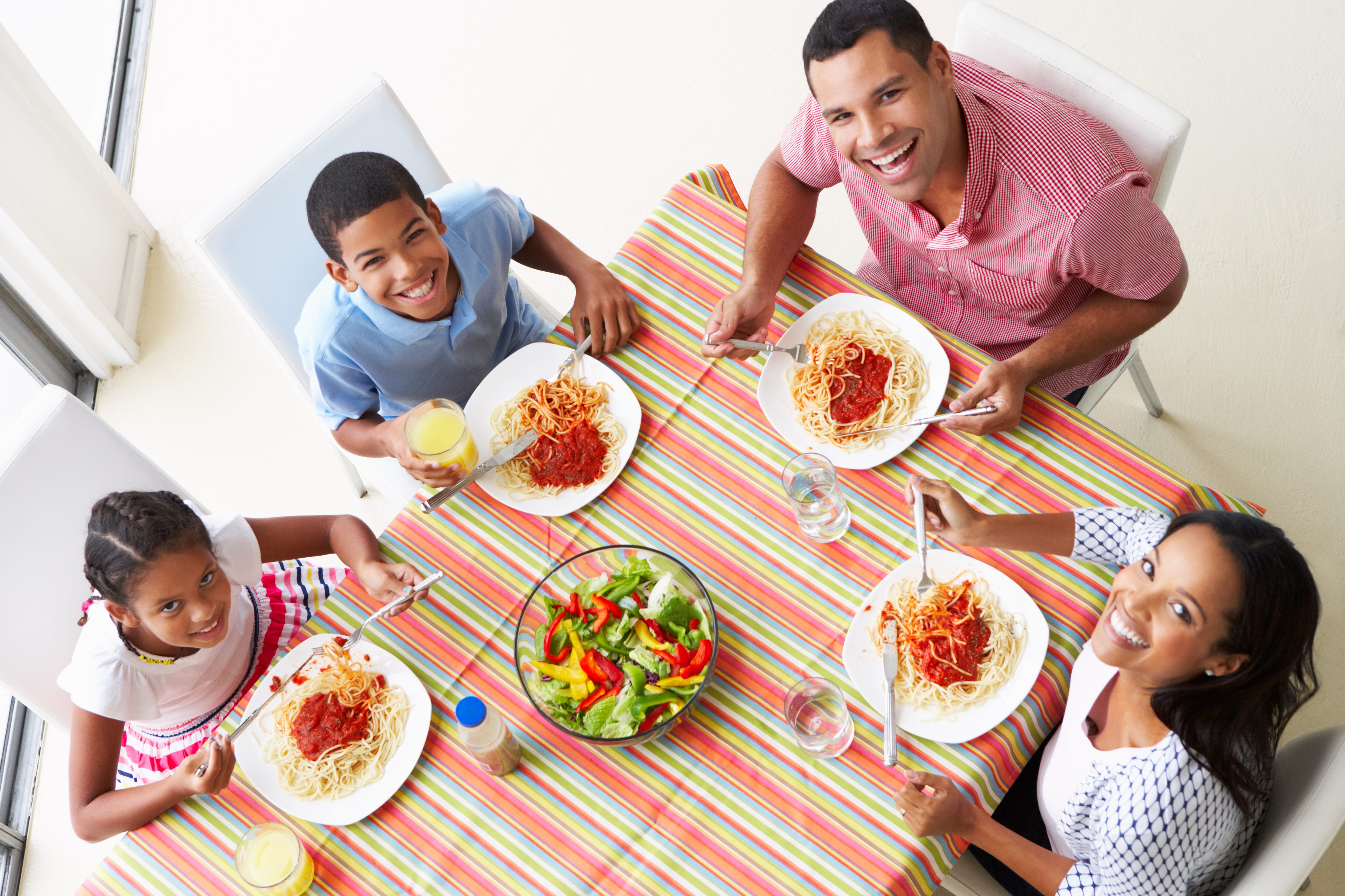 Family eating spaghetti
