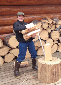 Kid chopping wood-the kingdom code-money management-kid entrepreneur-kid business